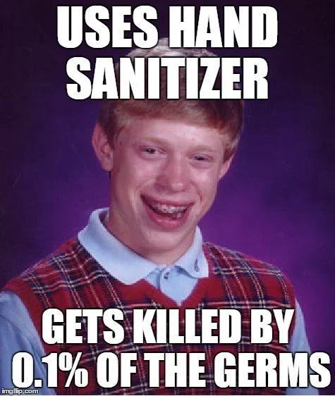 001 Of Germs — The 'Bad Luck Brian' meme showing a young man in red plaid with text 'USES HAND SANITIZER' above and 'GETS KILLED BY 0.1% OF THE GERMS' below.