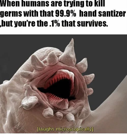 001 Of Germs — A scientific microscopy image of a bacterium with distinctive structures and open mouth-like feature, with text about surviving sanitizer and