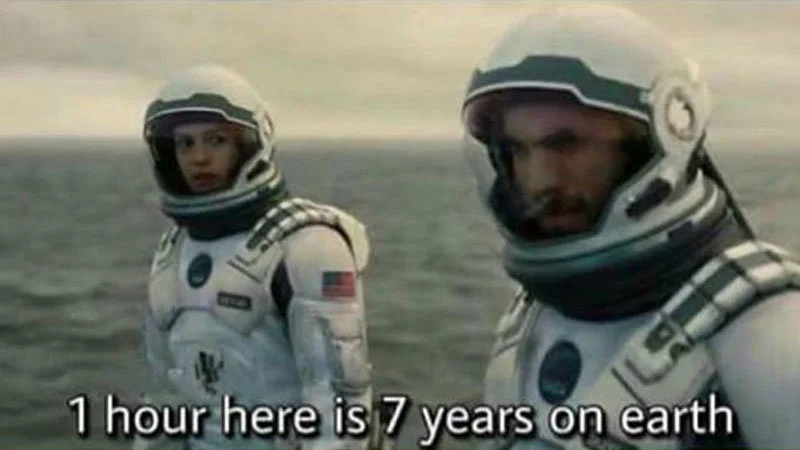 1 Hour Here Is 7 Years On Earth — A clean meme template showing two NASA astronauts in spacesuits on an alien planet with text about hour-to-year time