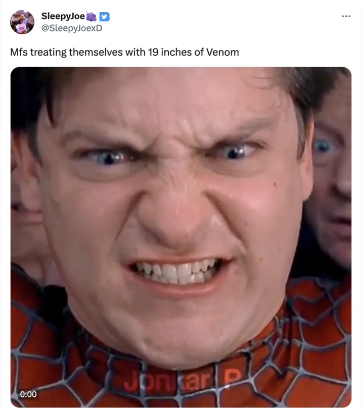 Spider-Man with intense expression and text about treating oneself with 19 inches of Venom.