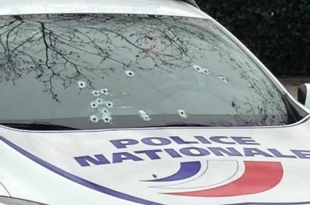 2015 Charlie Hebdo Terrorist Attack — Bullet-riddled windshield of a French Police Nationale vehicle after Charlie Hebdo attack