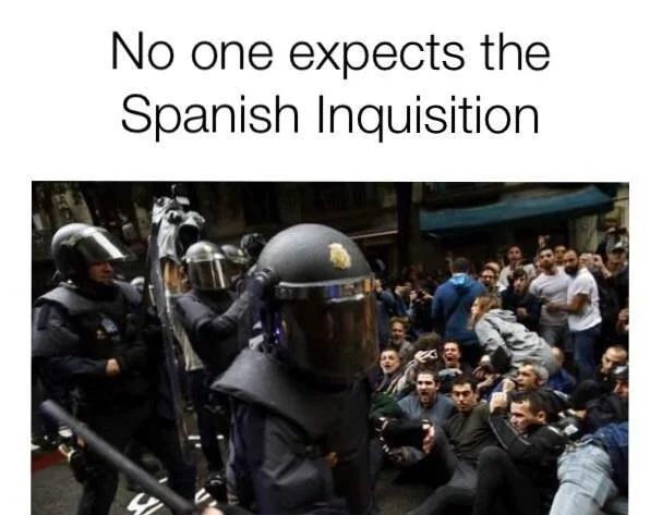 2017 Catalan Independence Referendum — Meme with Monty Python Spanish Inquisition caption over photo of Spanish riot police confronting protesters