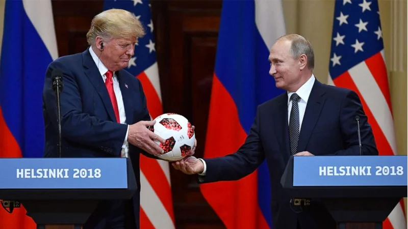 2018 Russia United States Summit — Trump and Putin exchange a soccer ball at Helsinki 2018 press conference