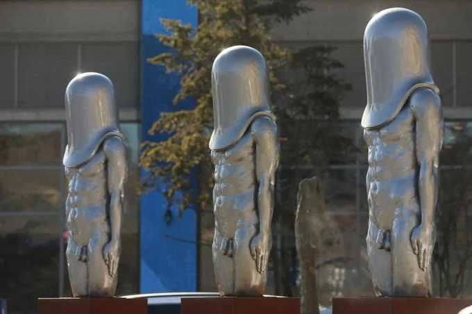 2018 Winter Olympics — Silver condom-shaped statues in a public plaza