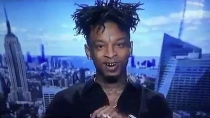 21 Savage Supervillain — Original unmodified photograph of 21 Savage with menacing expression and NYC skyline backdrop.