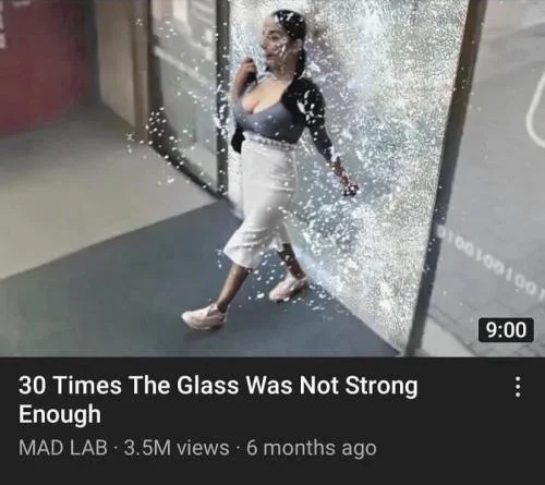 30 Times The Glass Was Not Strong Enough — Original meme source showing a woman in black crop top breaking through glass door with crystalline shards.