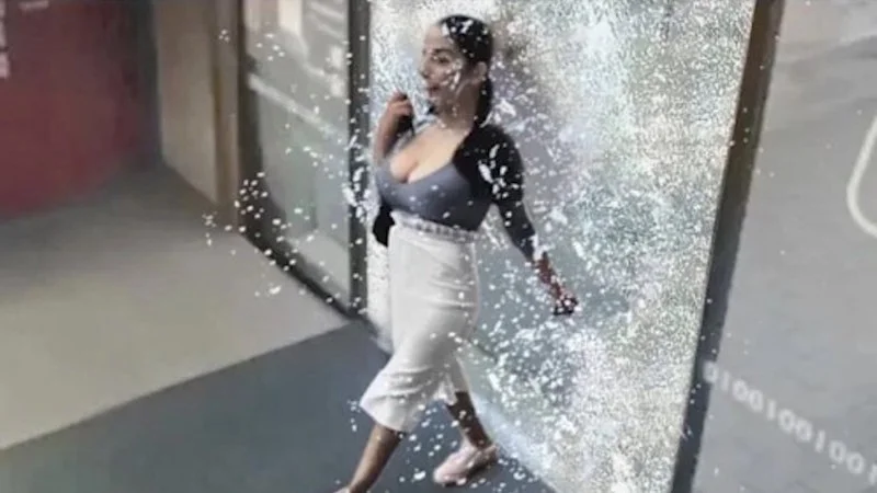 30 Times The Glass Was Not Strong Enough — Definitive original meme base image showing woman breaking through glass door with crystalline shards.