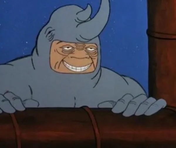 60S Spider Man Rhino — Clean template of Rhino character from 1967 Spider-Man with characteristic wide grin while peering over an object, capturing the iconic