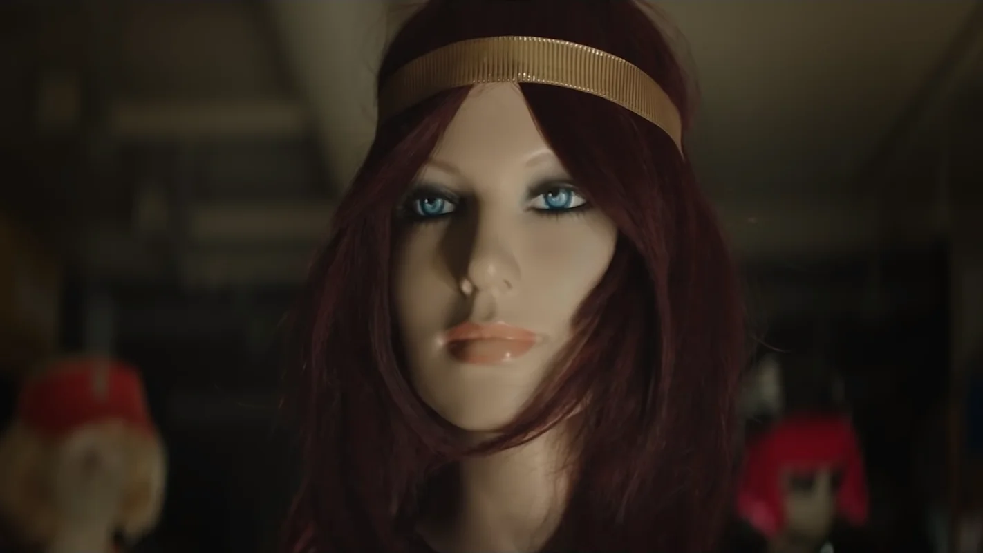 Aaron Smiths Dancin — Mannequin with red hair, blue eyes and gold headband from Aaron Smith Dancin music video