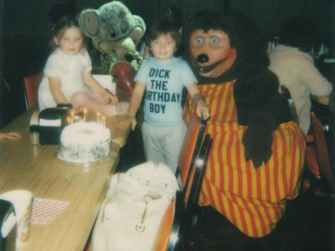 Abandoned Chuck E Cheese Animatronic — Vintage birthday party photo featuring early Chuck E. Cheese mascots