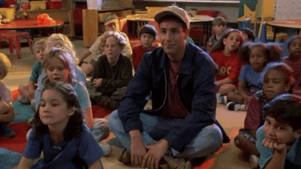 Adam Sandler Sitting With Kids / Billy Madison — Adam Sandler sitting cross-legged on the floor with a group of kindergarten kids in Billy Madison.