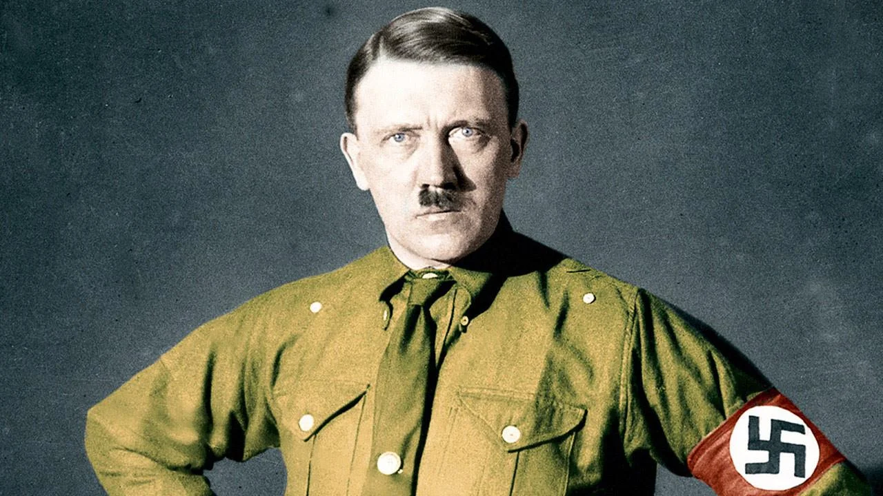 Colorized portrait of Adolf Hitler in Nazi uniform with swastika armband