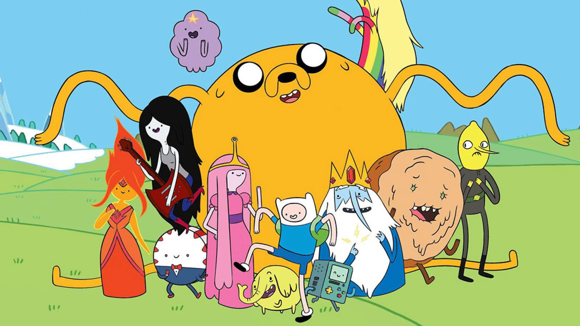 Adventure Time main cast including Finn, Jake, Princess Bubblegum, Marceline and Ice King posed together in a grassy landscape.