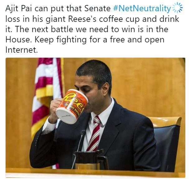 Tweet screenshot of Ajit Pai drinking from a giant Reese's coffee mug regarding the Senate net neutrality vote