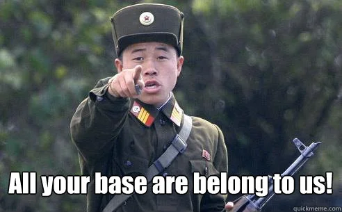 Photo of North Korean soldier pointing aggressively with 'All your base are belong to us!' caption.