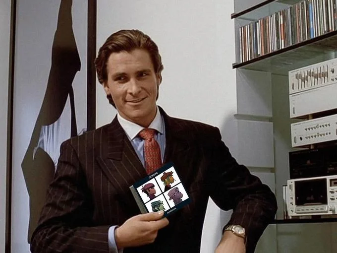 American Psycho — Patrick Bateman holding up a Gorillaz self-titled album CD.