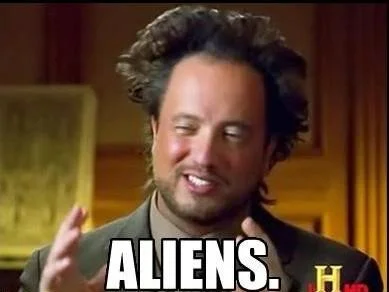 Ancient Aliens — Giorgio A. Tsoukalos with simple 'ALIENS.' text overlay in classic meme macro format.