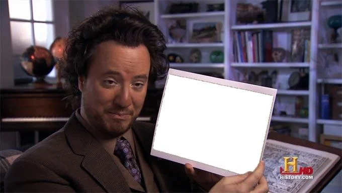 Ancient Aliens — Giorgio A. Tsoukalos holding a blank laptop or tablet screen in a modified meme format.
