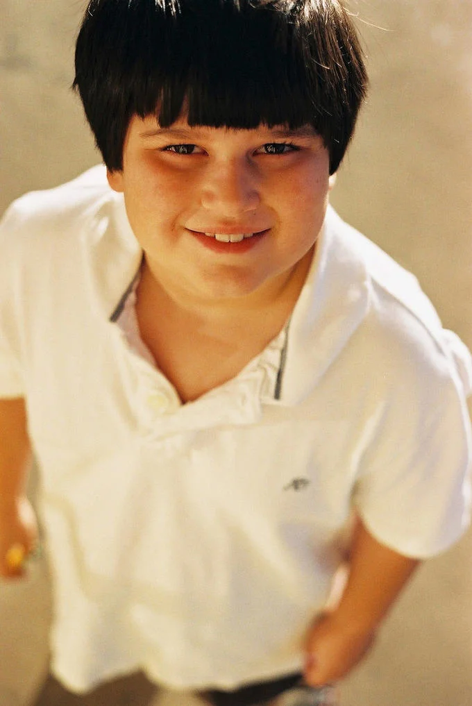 Annoying Childhood Friend — Clean template of young boy in white polo shirt with characteristic smiling expression.