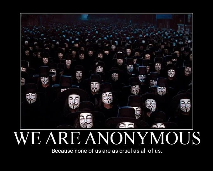 Hacktivism — Crowd in Guy Fawkes masks with caption We Are Anonymous