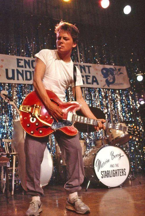 Back To The Future — Marty McFly playing red electric guitar at the Enchantment Under the Sea dance