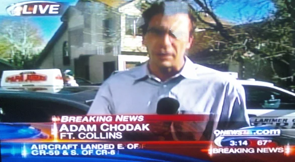 Balloon Boy — Live news broadcast screenshot showing Richard Heene speaking to media with house background.