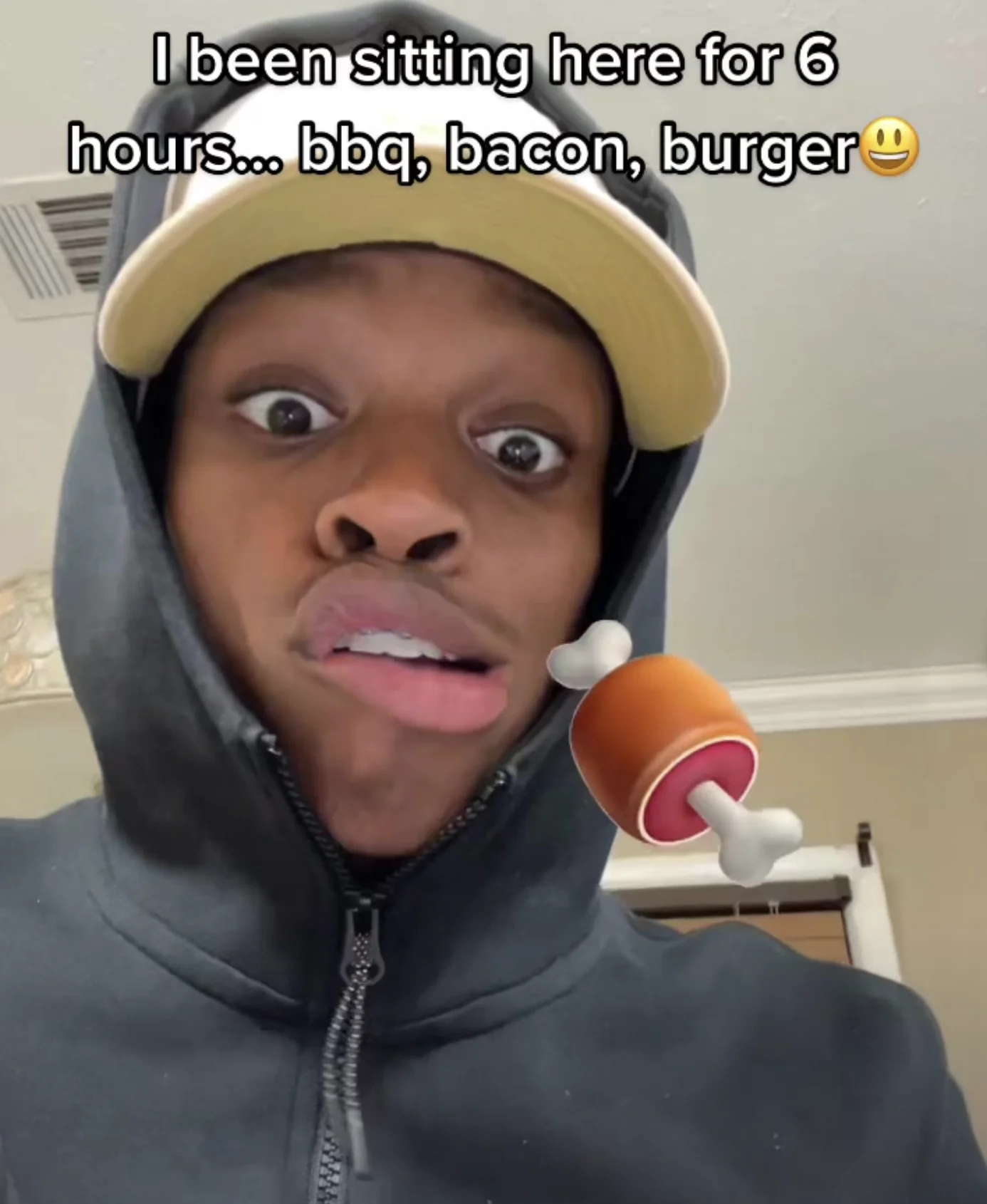 Barbeque Bacon Burger (TikTok Challenge) — TikTok selfie of a young man in a hoodie making an exasperated face with text 'I been sitting here for 6 hours...