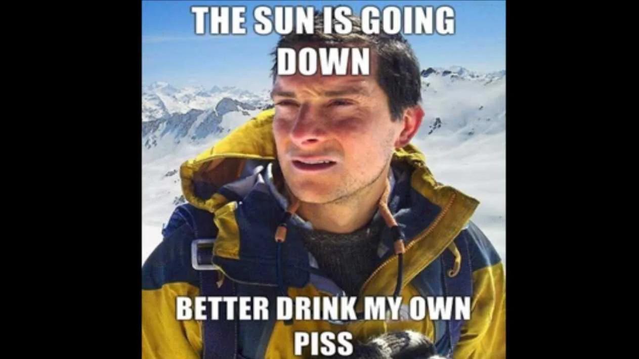 Bear Grylls Better Drink My Own Piss — Bear Grylls on a snowy mountain with meme caption reading 'The sun is going down, better drink my own piss'