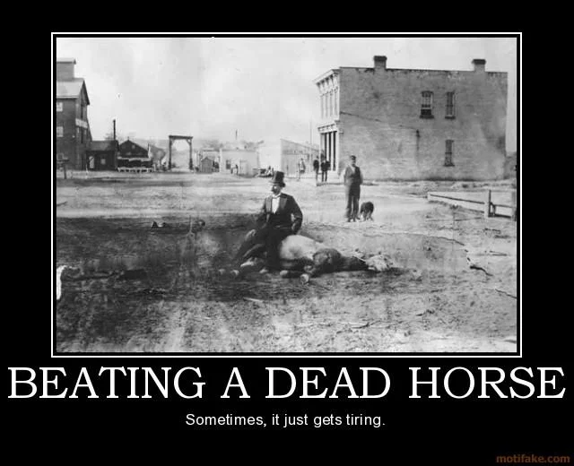 Demotivational poster titled 'Beating a Dead Horse' showing a man on a dead horse in an old town
