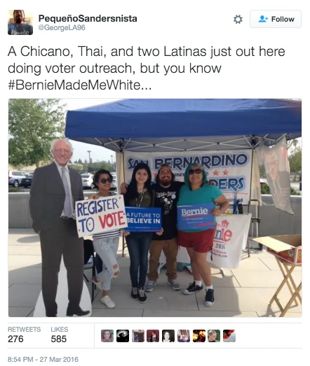 Berniemademewhite — A Twitter screenshot from @GeorgeLA96 showing four diverse people staffing a Bernie Sanders voter registration table in San Bernardino with
