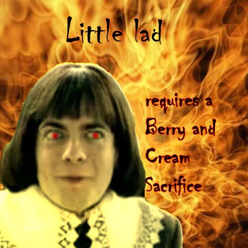 Berries and Cream — Little Lad with red glowing eyes in front of flames with text demanding a berry and cream sacrifice.