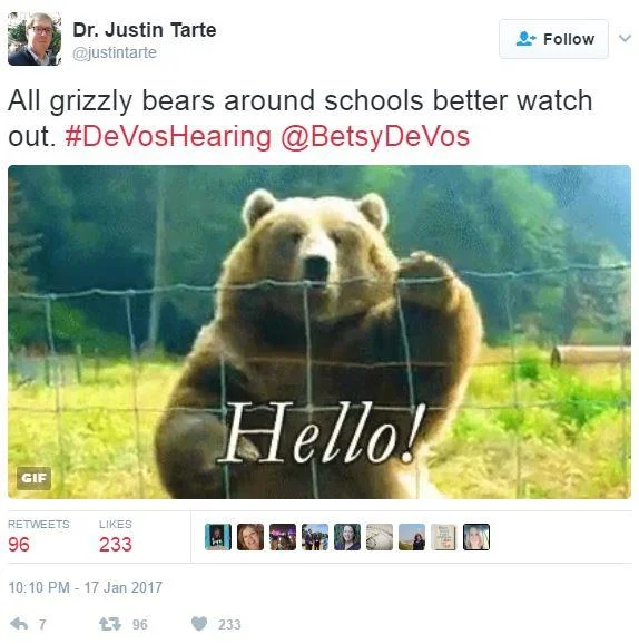 Betsy DeVos' "Grizzly Bear Attacks" Remark — Tweet from Dr. Justin Tarte joking about grizzly bears around schools with a waving bear GIF