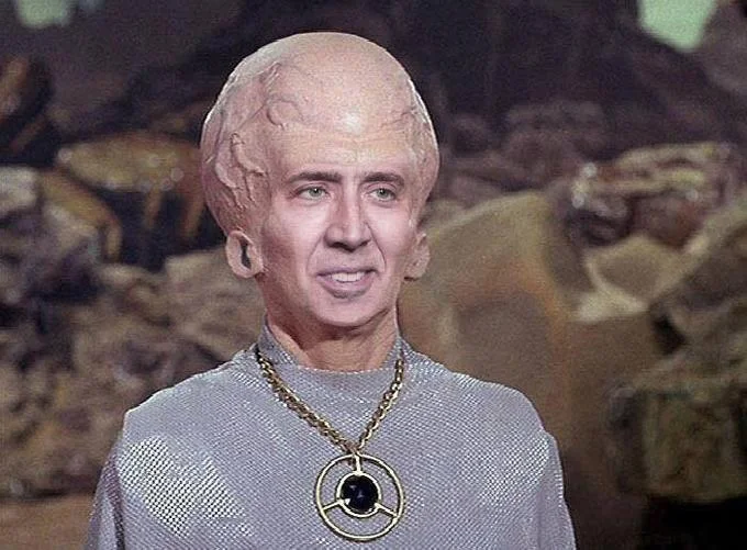 Big Brain Alien — Talosian alien body with Nicolas Cage face edited on the head