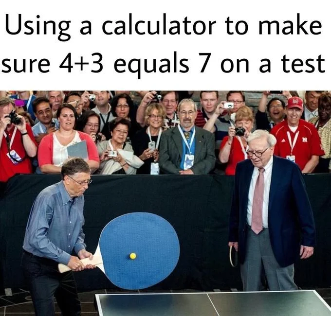 Bill Gates Giant Ping Pong Paddle — High-resolution photo of Bill Gates with oversized blue paddle facing Warren Buffett as crowd takes photos
