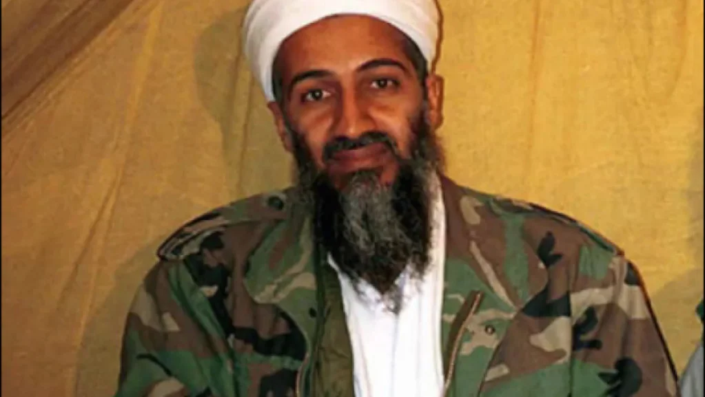 Bin Laden Files — Osama bin Laden in white turban and camouflage jacket