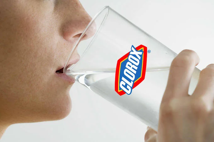 Bleach Drinking — Person drinking from a glass with a Clorox bleach logo overlaid
