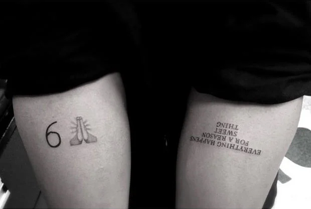 Blessed — Tattoos on thighs showing '6' with praying hands emoji and inspirational quote text