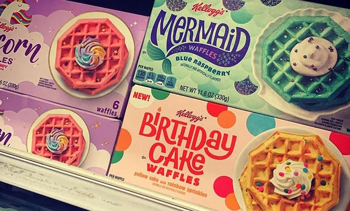 Blue Waffle — Kellogg's Mermaid Waffles blue raspberry box on shelf with other novelty waffle boxes