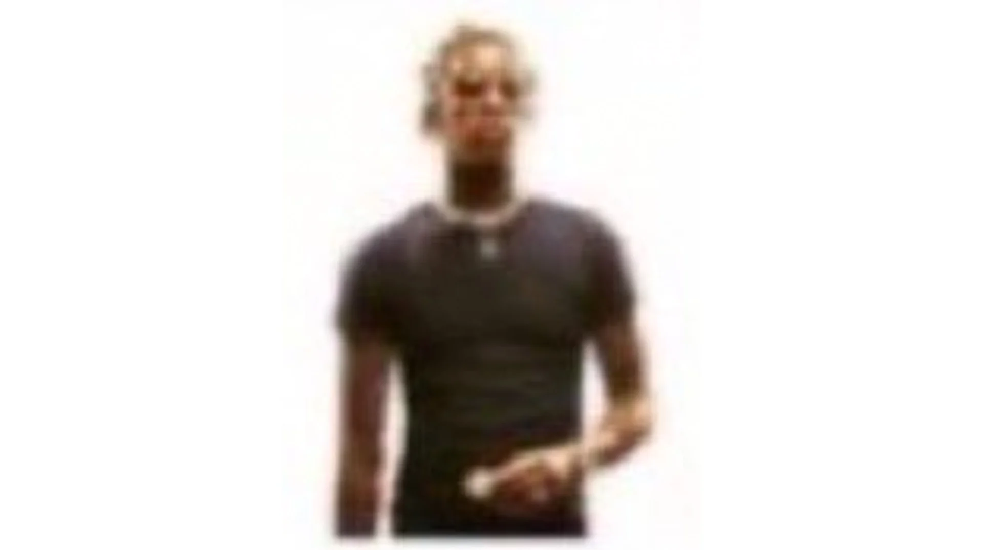 Blurry Young Thug Photo — Blurry photo of Young Thug in a black t-shirt against a white background.
