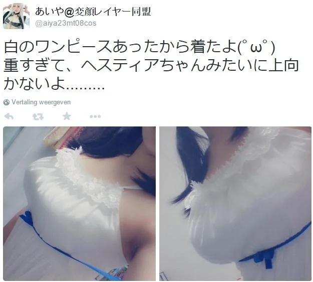 Boob Ribbon — Twitter post of cosplayer wearing white dress with blue Hestia-style ribbon