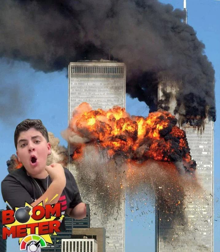 Boom Meter reviewer and logo edited over an image of the burning Twin Towers.