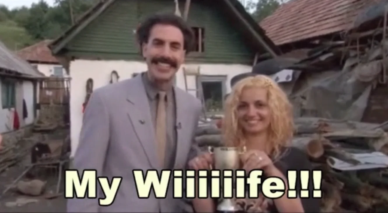 Borat Voice My Wife — Borat proudly presenting his wife holding a trophy with caption My Wiiiiiife!!!