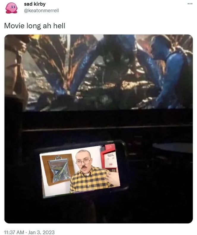 Boring Ahh Family Guy Episode — Tweet by keatonmerrell showing the Avatar-cinema meme with a phone playing a YouTube clip, captioned 'Movie long ah hell'