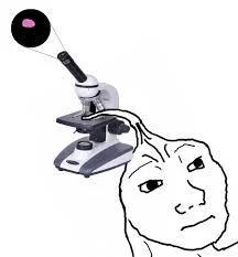 Brainlet — Simple crude stick figure with a microscope hovering above, suggesting scientific examination or mockery of low intelligence.