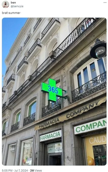 A tweet by @benryle captioned 'brat summer' shows a European pharmacy building with a large lime-green illuminated cross sign displaying '365.'