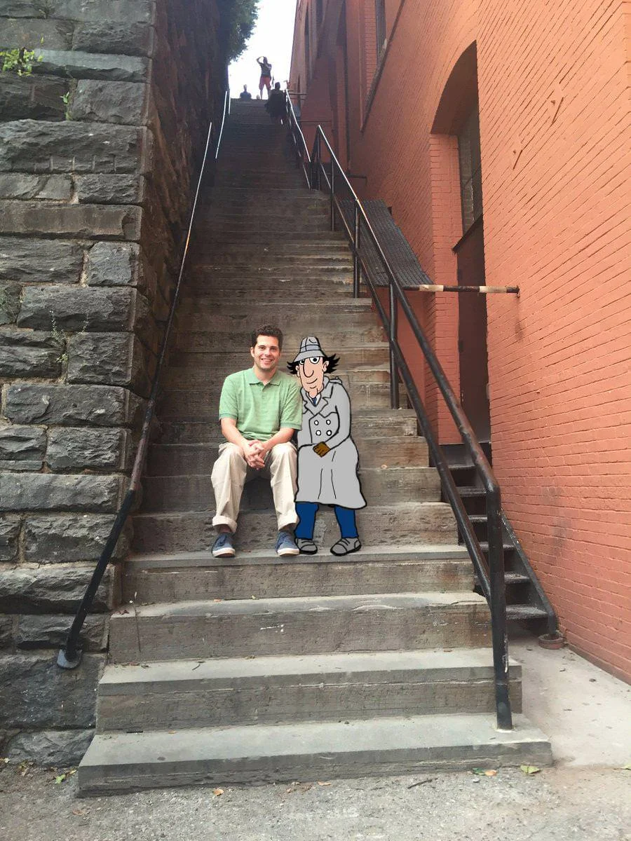 Brown Bricks/Minecrap — Man on steps with Inspector Gadget cartoon photoshopped beside him