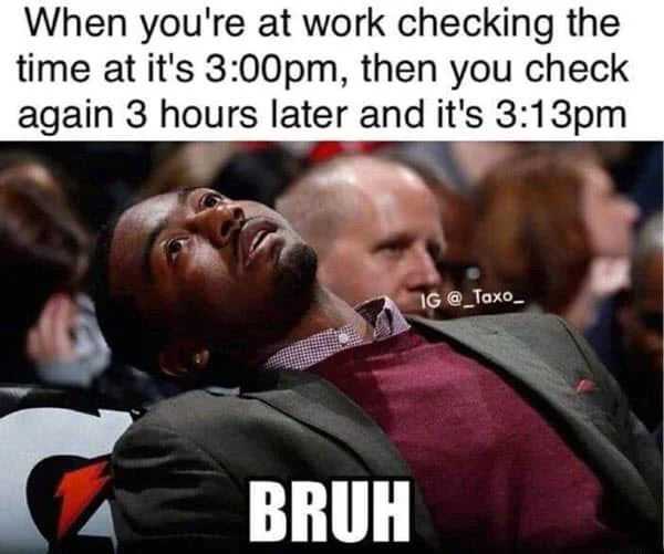 Man in suit leaning back dramatically in arena seat with caption 'When you're at work checking the time at it's 3:00pm, then you check again 3 hours later and