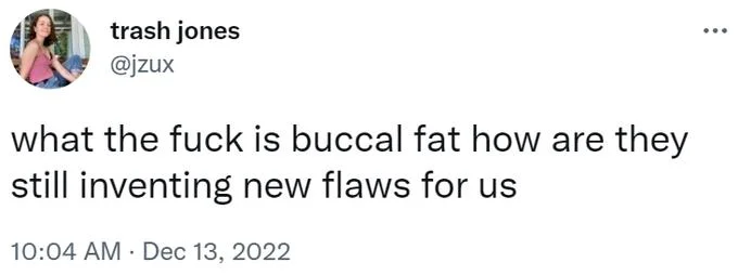 Buccal Fat Removal — Twitter screenshot from @jzux reading 'what the fuck is buccal fat how are they still inventing new flaws for us,' posted December 13