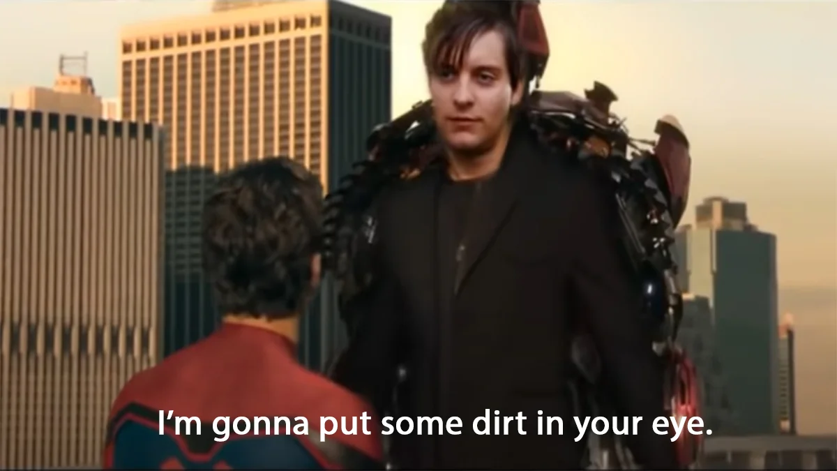 Tobey Maguire as Bully Maguire in dark outfit with Iron Spider arms facing another Spider-Man with caption 'I'm gonna put some dirt in your eye.'
