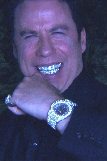 Bust Down Keanu — An AI image of "bust down travolta." It shows john travolta flexing.